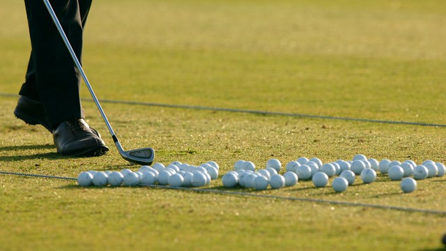 Collection of golf balls on green